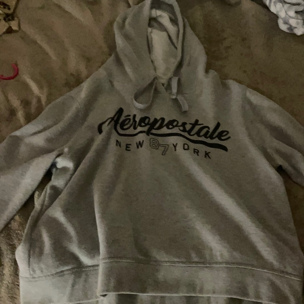 A grey Aeropostale sweater